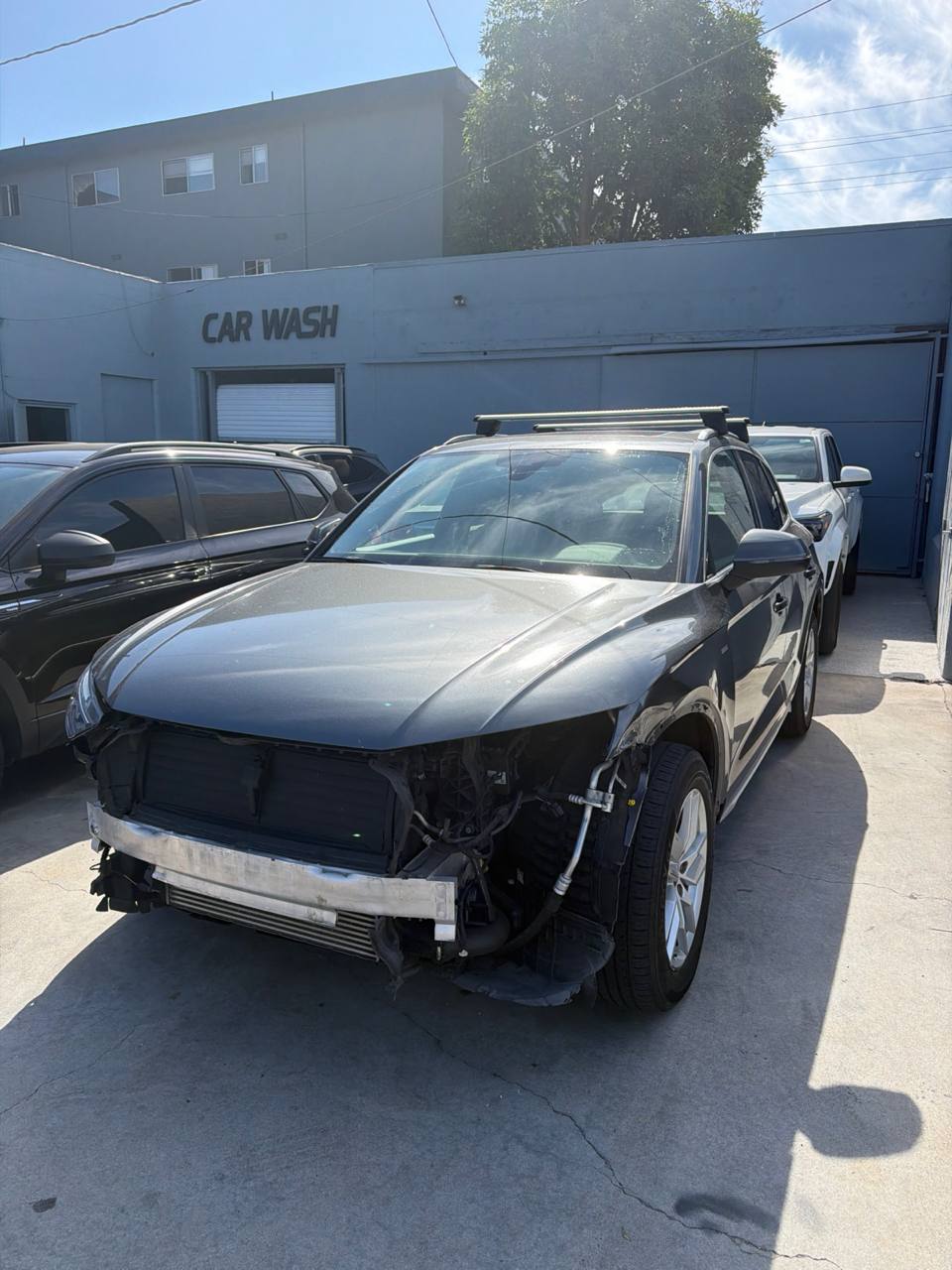 Front view of a damaged Audi Q5 with the bumper assembly removed