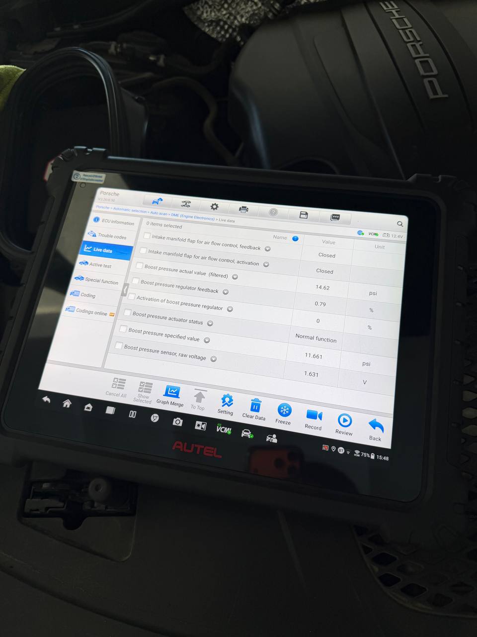 Diagnostic scan tool showing Porsche Macan boost-control live data after repair