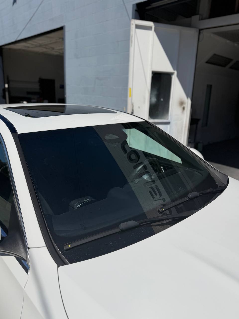 New clear windshield installed on a repaired Mercedes-Benz C300