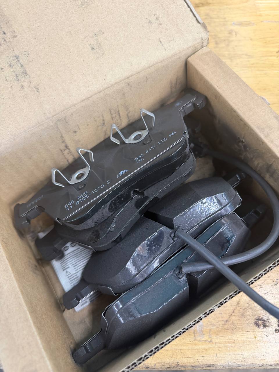 Original-equipment Bentley brake pads prepared for service