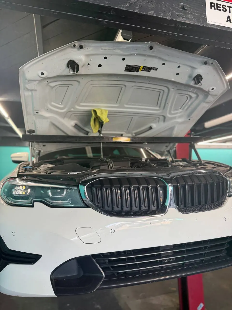 BMW engine bay with an engine-support bar in place