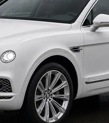 Bentley front-left exterior in the paired supplied later photograph