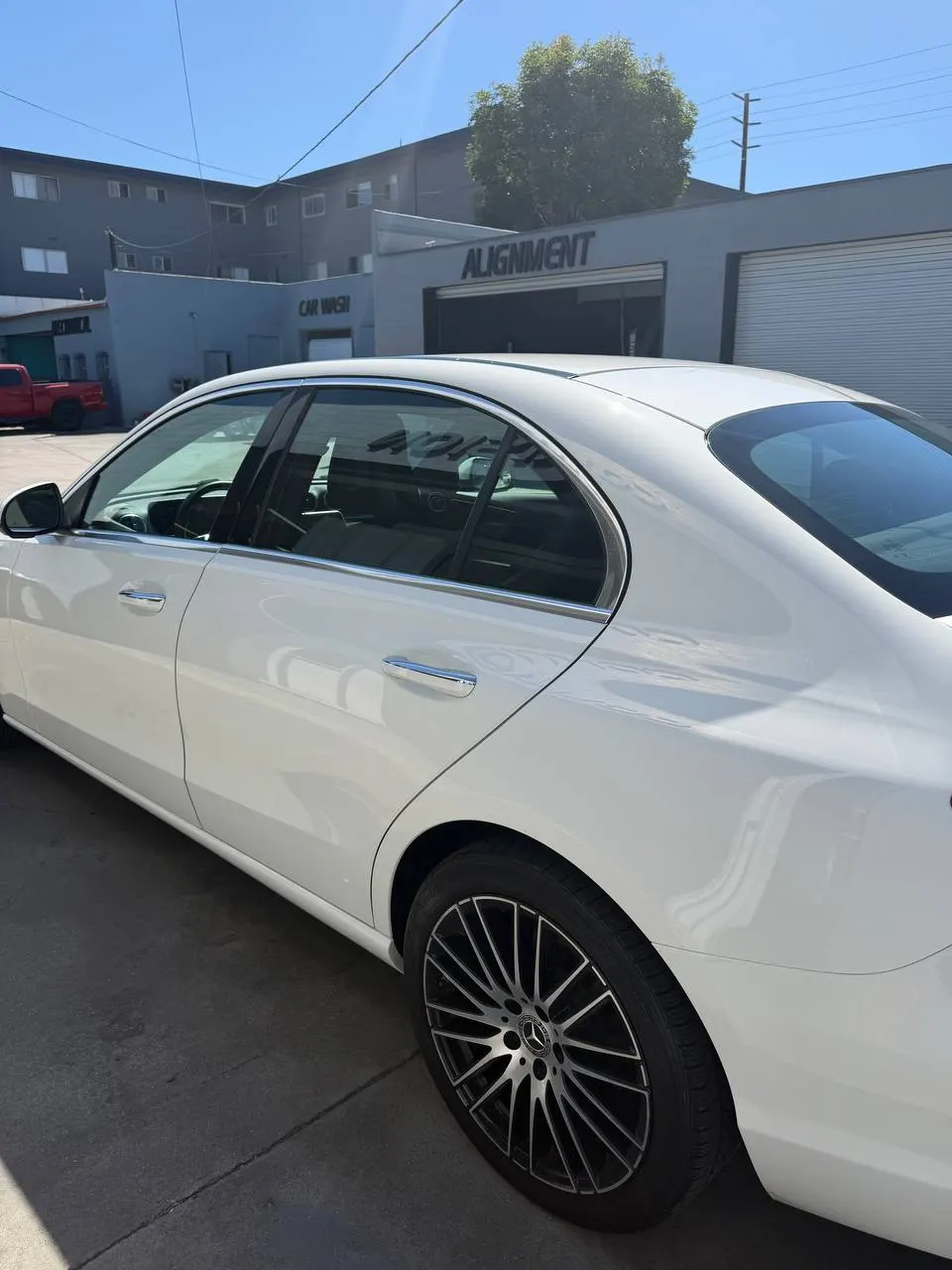 Completed side finish on a white Mercedes-Benz C300 at Calibri Motorsport