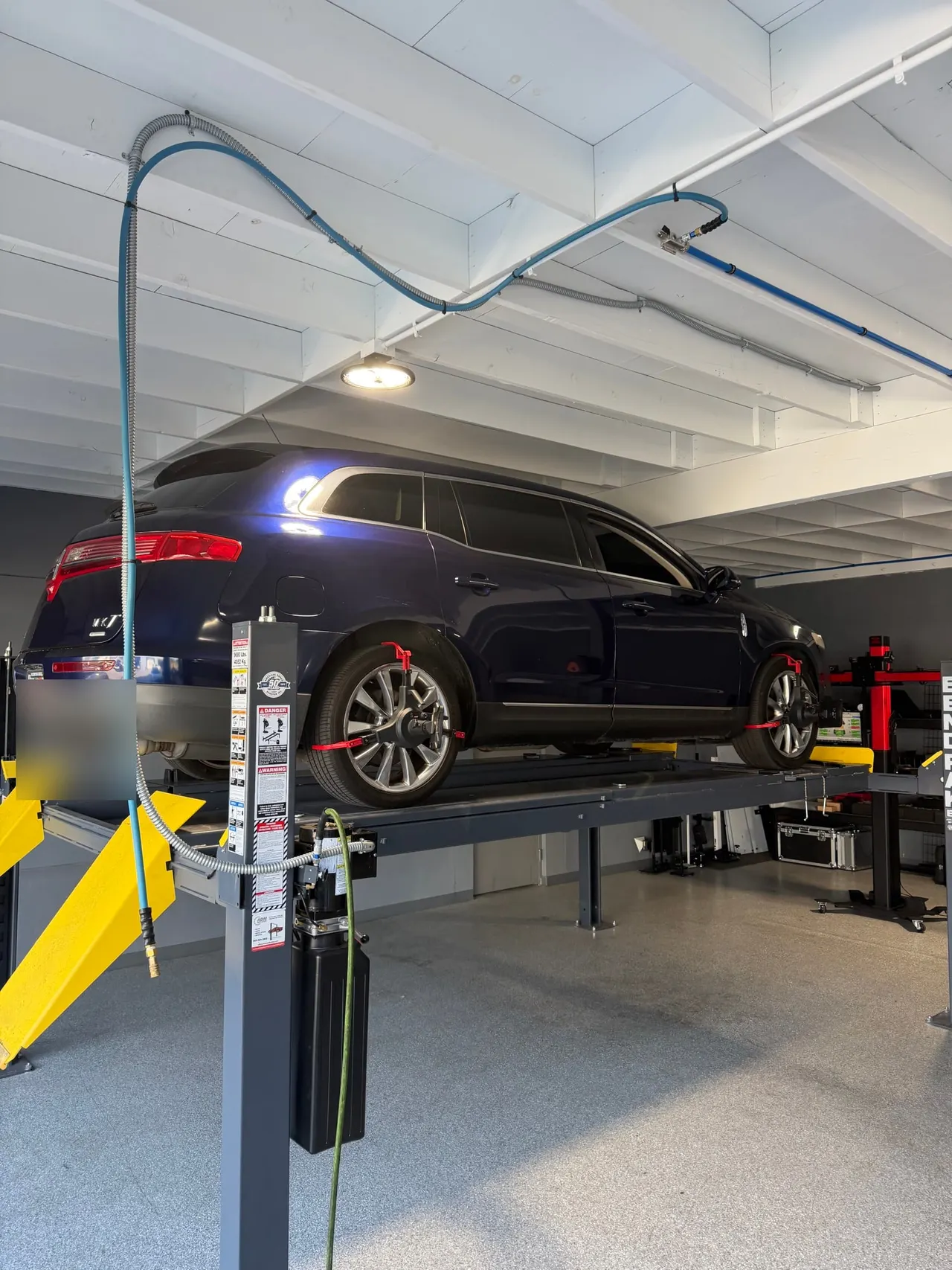 Vehicle on the alignment rack at Calibri Motorsport