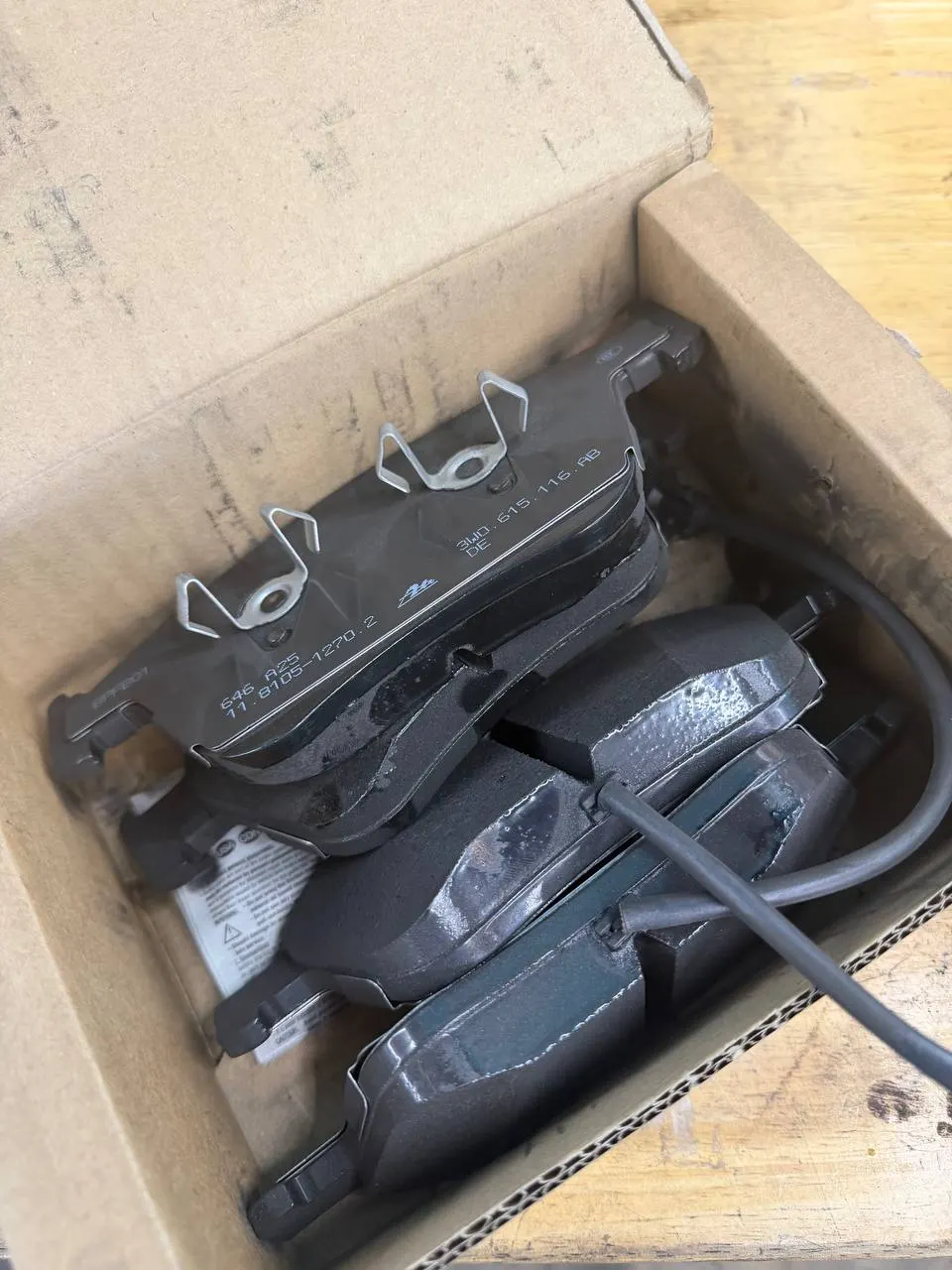 Original-equipment Bentley brake pads prepared for service